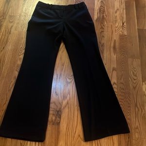 Limited Studio 400 black size 4 polyester, nylon. And spandex